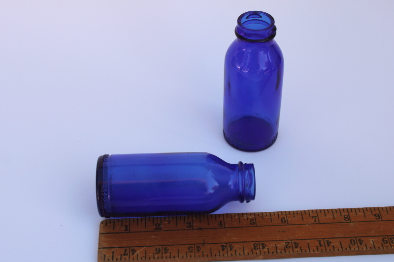 photo of vintage blue glass medicine bottles Emerson Drug Bromo Seltzer embossed bottles  #4