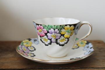 catalog photo of vintage bone china tea cup & saucer Rita art deco floral primroses on black border 
