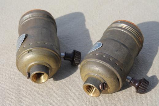 photo of vintage brass Leviton lamp sockets, tarnished brass w/ Remmington lamp labels #2