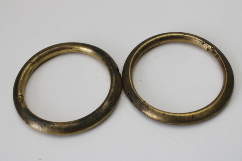 photo of vintage brass bull rings, smaller size heavy solid brass rings w/ tarnished patina  #1