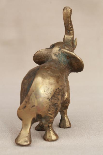 photo of vintage brass elephant figurine, miniature brass animal, lucky elephant trunk up #3