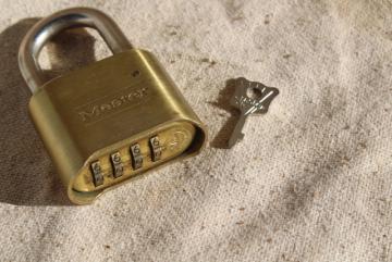 catalog photo of vintage brass padlock Master Lock #175, key & four digit number combination