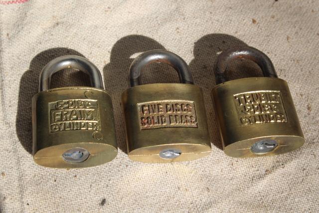 photo of vintage brass padlocks, old five disc cylinder locks Fraim & Trubilt #1