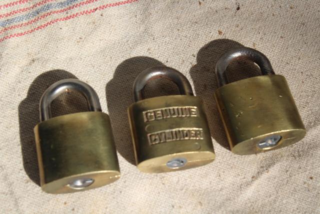photo of vintage brass padlocks, old five disc cylinder locks Fraim & Trubilt #3