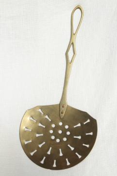 catalog photo of vintage brass skimmer, long handle strainer spoon, fireplace hearth or kitchen tool