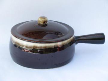 catalog photo of vintage brown drip pottery, large french casserole w/ stick handle