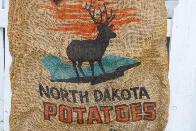 photo of vintage burlap bag potato sacks w/ print graphics Big L buck deer silhouette #2