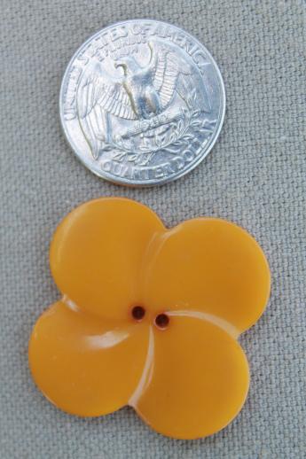 photo of vintage butterscotch bakelite button, large clover leaf flower shape charm or jewelry button #1