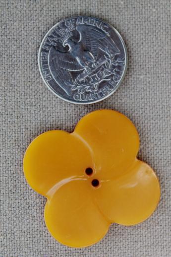 photo of vintage butterscotch bakelite button, large clover leaf flower shape charm or jewelry button #3