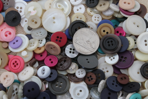 photo of vintage buttons collection, old glass barrel jar full of buttons of all kinds #2