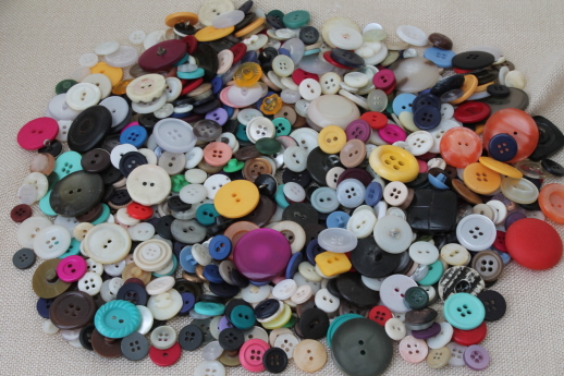 photo of vintage buttons collection, old glass barrel jar full of buttons of all kinds #4