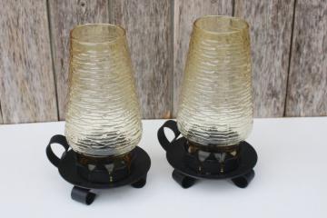 catalog photo of vintage candle lamps, rustic black iron candleholders w/ amber glass hurricane shades