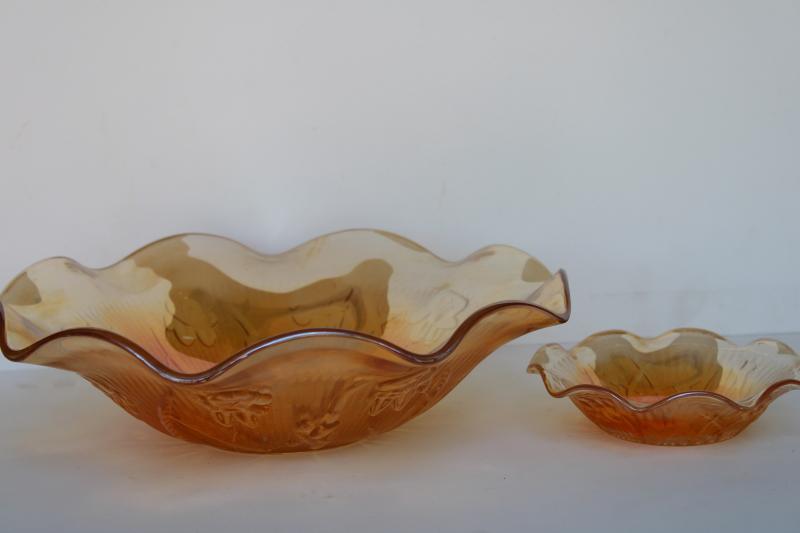 photo of vintage carnival glass bowls, marigold iridescent Jeannette iris and herringbone floragold #1