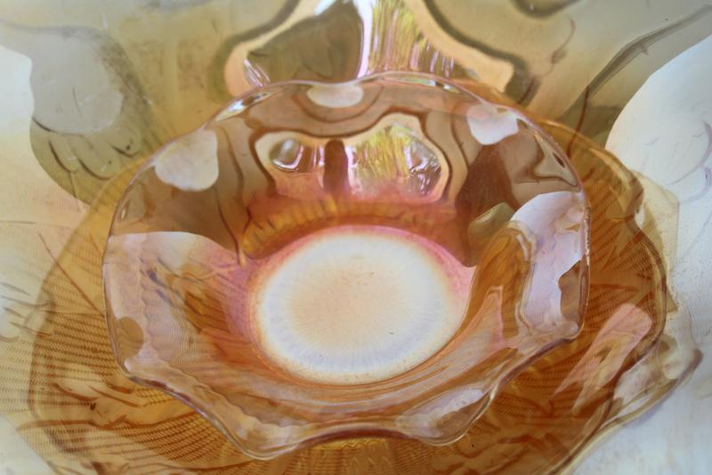 photo of vintage carnival glass bowls, marigold iridescent Jeannette iris and herringbone floragold #4