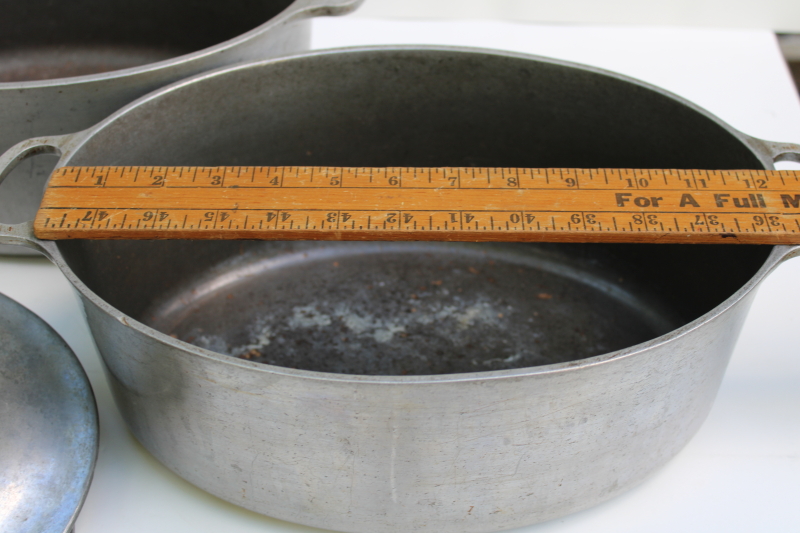 photo of vintage cast aluminum oval dutch ovens or roasters, lot of two roasting pans w/ lids  #9