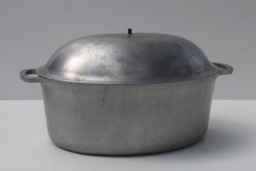 catalog photo of vintage cast aluminum oval roaster or dutch oven, Majestic cookware pot with lid 