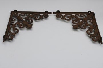 catalog photo of vintage cast iron corbels, ornate filigree shelf brackets antique reproduction hardware 