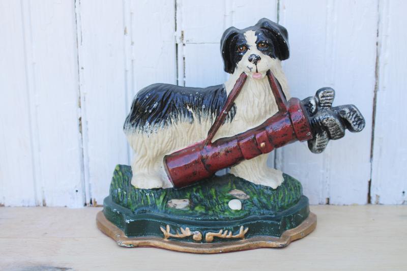 photo of vintage cast iron doorstop or fireplace dog, black & white landseer w/ golf clubs bag #1