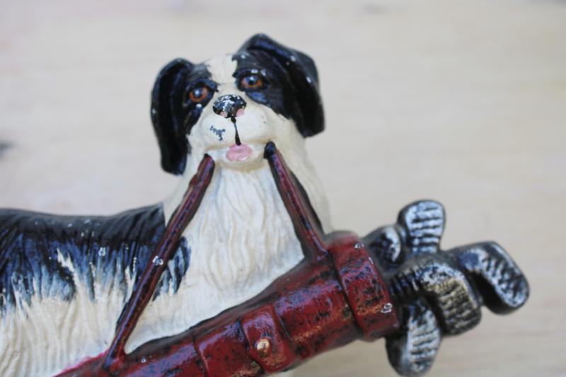 photo of vintage cast iron doorstop or fireplace dog, black & white landseer w/ golf clubs bag #5