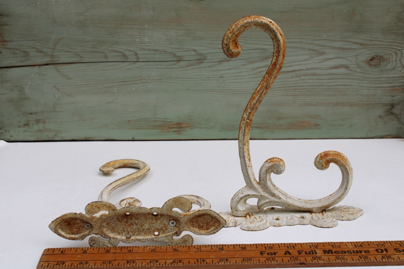 photo of vintage cast iron hooks, large ornate wall mount plant hangers or coat hooks w/ old white paint  #5
