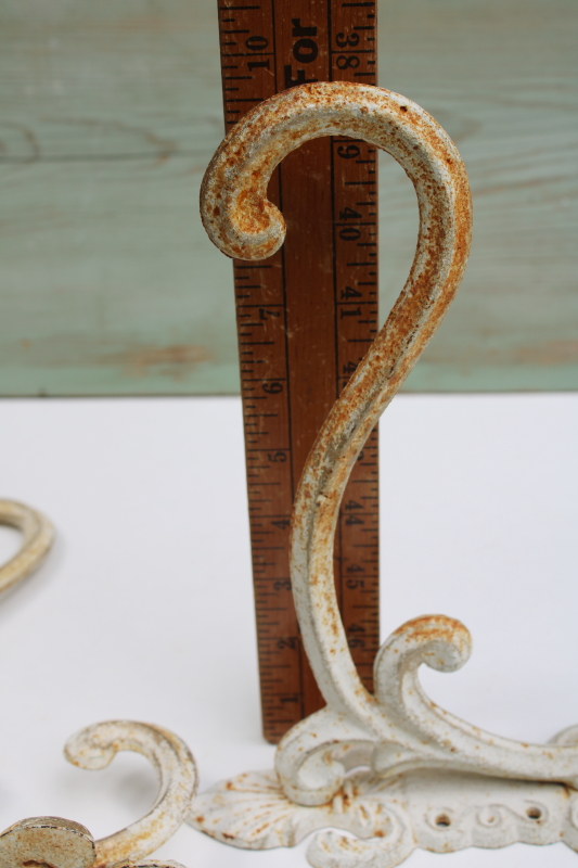 photo of vintage cast iron hooks, large ornate wall mount plant hangers or coat hooks w/ old white paint  #6