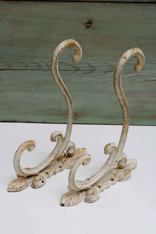 photo of vintage cast iron hooks, large ornate wall mount plant hangers or coat hooks w/ old white paint  #8