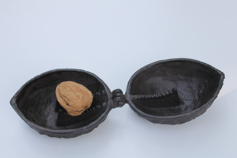 photo of vintage cast iron nut cracker, large walnut shape covered box, hinged lid nutcracker #2