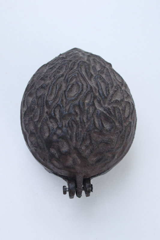 photo of vintage cast iron nut cracker, large walnut shape covered box, hinged lid nutcracker #4