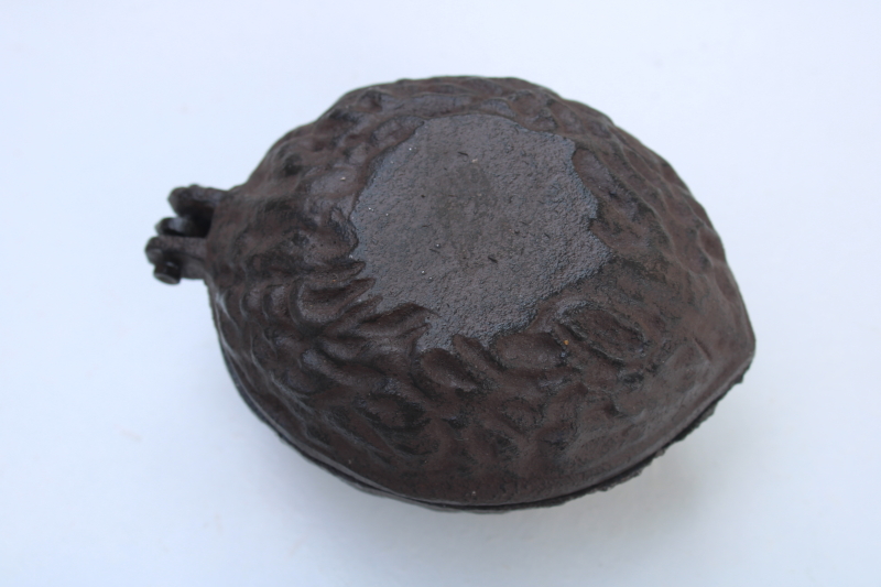 photo of vintage cast iron nut cracker, large walnut shape covered box, hinged lid nutcracker #5