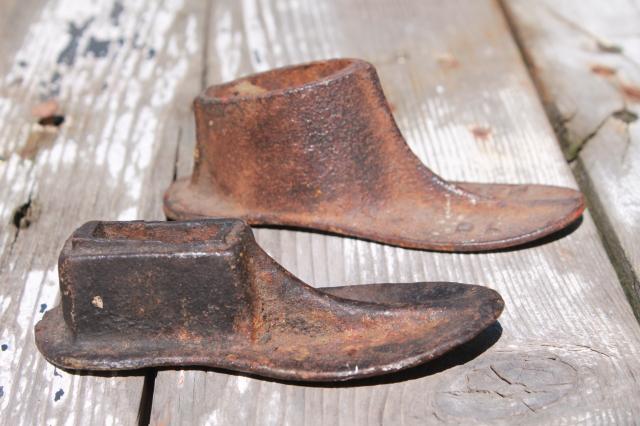 photo of vintage cast iron shoe last set w/ metal foot shape stretchers, feet in all sizes #10