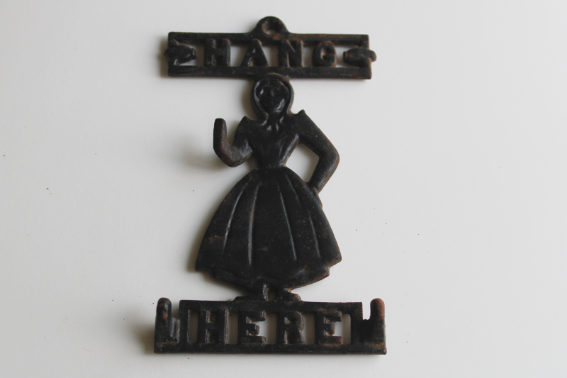 photo of vintage cast iron wall hanging hook Hang Here Pennsylvania Dutch country Amish girl  #1