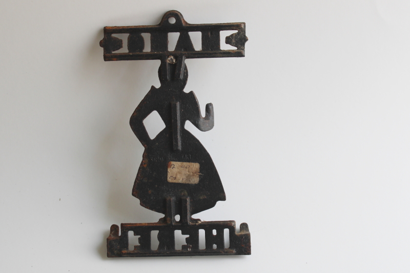 photo of vintage cast iron wall hanging hook Hang Here Pennsylvania Dutch country Amish girl  #3