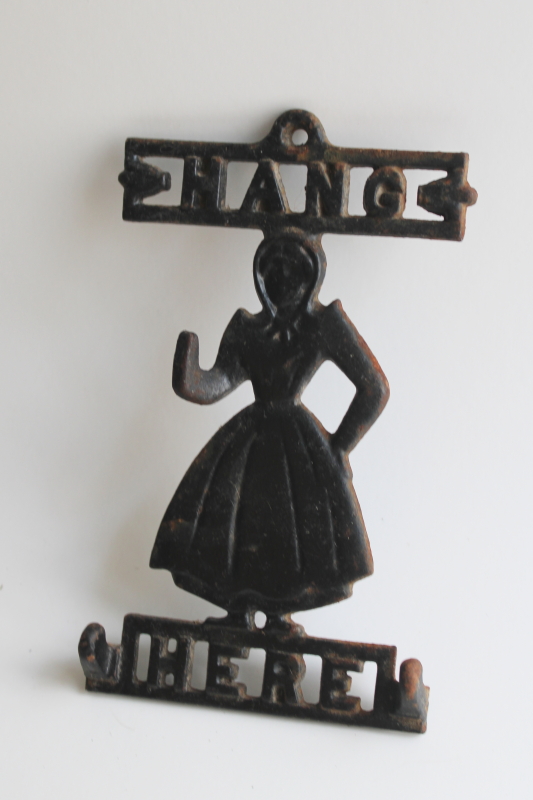 photo of vintage cast iron wall hanging hook Hang Here Pennsylvania Dutch country Amish girl  #4