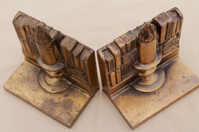 photo of vintage cast metal bookends w/ antique brass finish, book & candle stick stacks of books #2