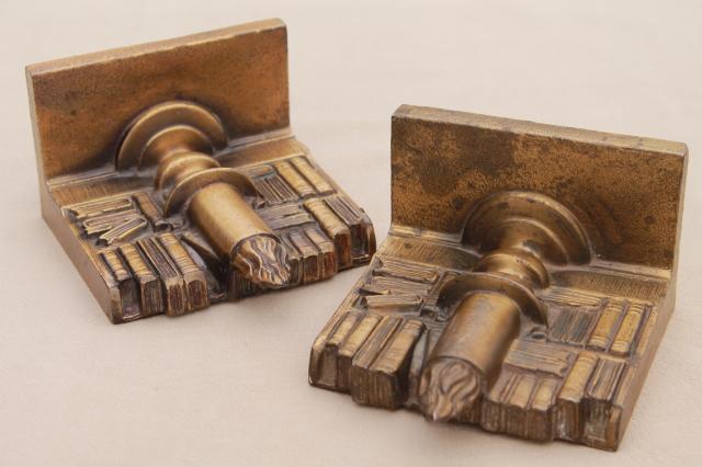 photo of vintage cast metal bookends w/ antique brass finish, book & candle stick stacks of books #8