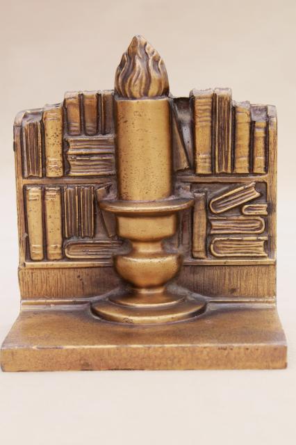 photo of vintage cast metal bookends w/ antique brass finish, book & candle stick stacks of books #10