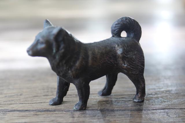 photo of vintage cast metal bronze dog miniature figurine, wolf, malamute or husky #1