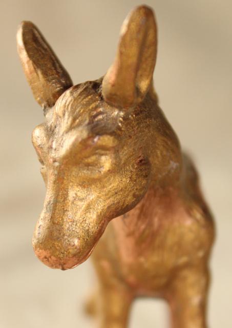 photo of vintage cast metal donkey, small spelter animal figure w/ worn old copper brass finish #9