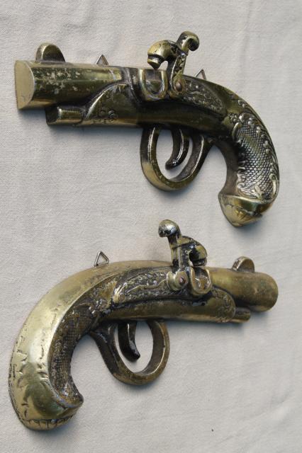 photo of vintage cast metal wall plaques, wild west flintlock pistols wall art retro decor #3