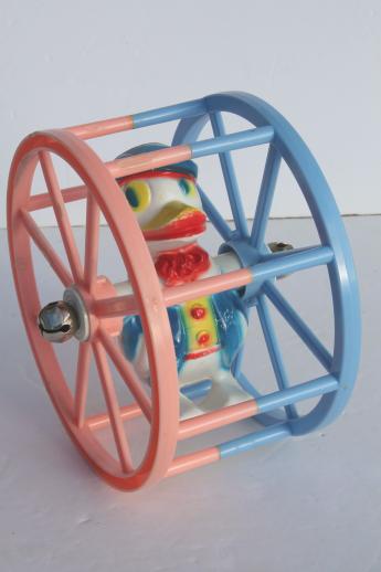 photo of vintage celluloid plastic baby toy, sailor duck spinner wheel rolling push toy #1