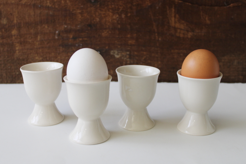 photo of vintage ceramic egg cups set of four, classic ivory white china egg holders #1