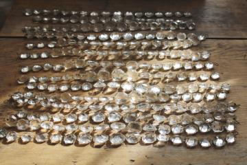 catalog photo of vintage chandelier crystals swagging, strings of graduated faceted gem shape beads, glass prisms garland 