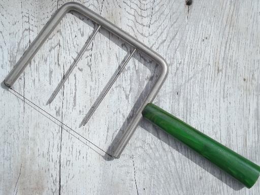 photo of vintage cheese slicer or cake breaker w/ green bakelite  handle #1