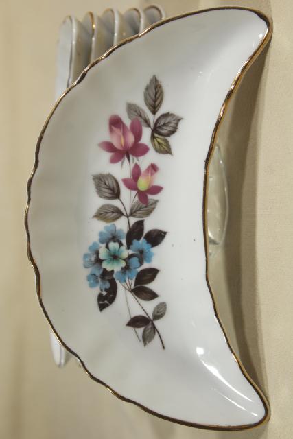 photo of vintage china bone dishes w/ different floral patterns, crescent shaped side plates #8