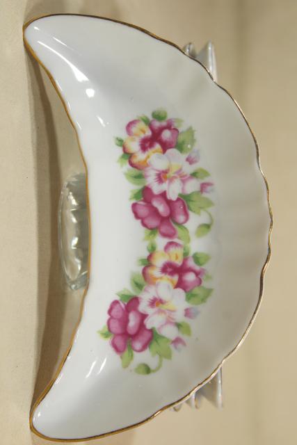 photo of vintage china bone dishes w/ different floral patterns, crescent shaped side plates #10