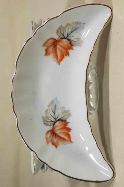 photo of vintage china bone dishes w/ different floral patterns, crescent shaped side plates #11