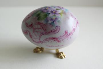 catalog photo of vintage china egg w/ hand painted violets, artist signed Easter egg & metal stand