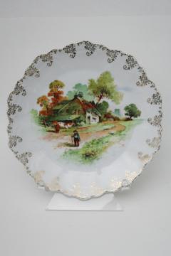 catalog photo of vintage china plate wall hanging, old English farm scene w/ cows & thatched cottage