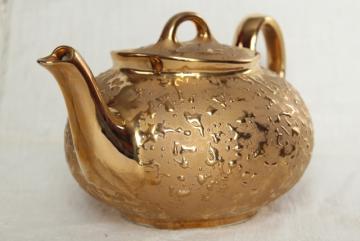 catalog photo of vintage china teapot w/ encrusted gold, weeping gold metallic tea pot