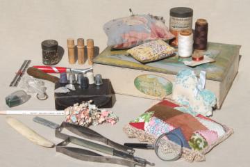 catalog photo of vintage chocolate candy tin needlework box full of old sewing notions & tools